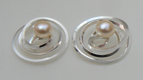 Pink pearls in silver earrings