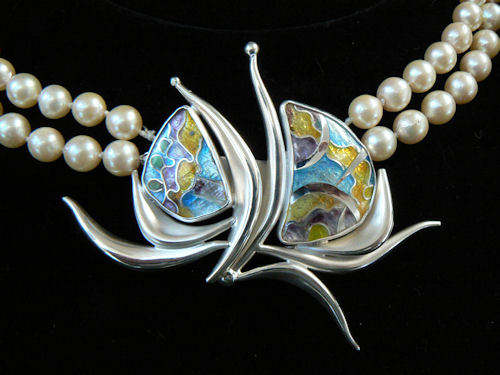 Silver and enamel clasp for earls