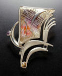 Sterling silver and enamel pin