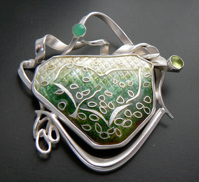 Leaf shaped pin in silver with enamel