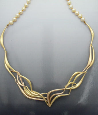 Gold hand formed necklace