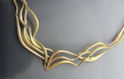 Detail of hand formed gold necklace