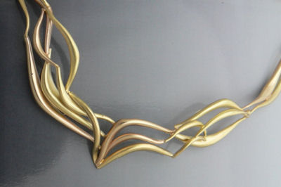 detail of gold necklace